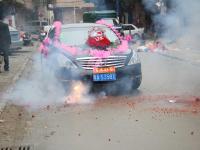 Wedding car being firecrackered
